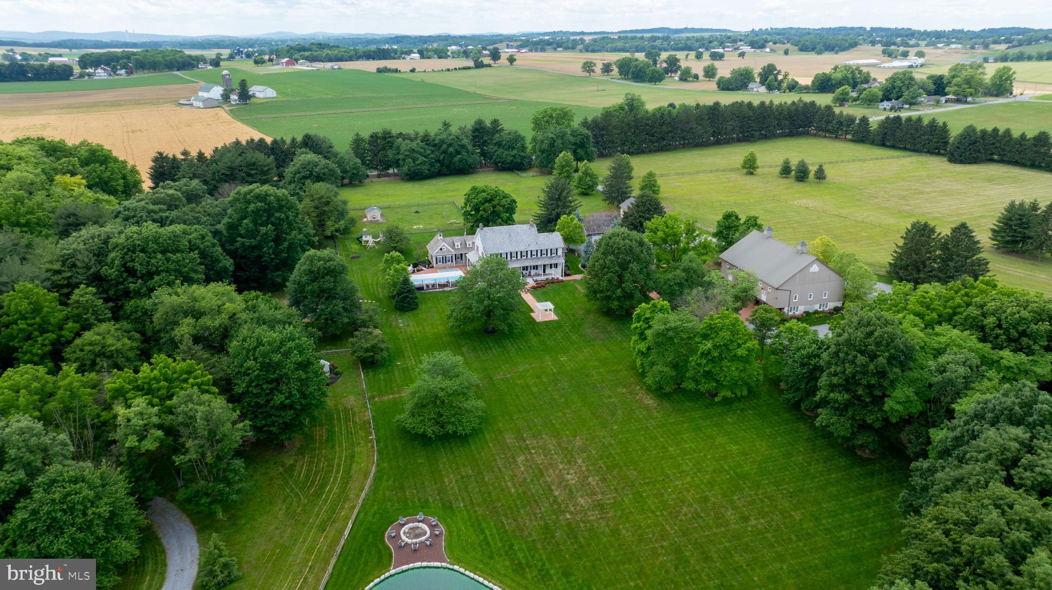 1610 Landis Road Mount Joy, PA 17552 - Photo 5 of 150 an aerial view of lake with residential houses with outdoor space and swimming pool
