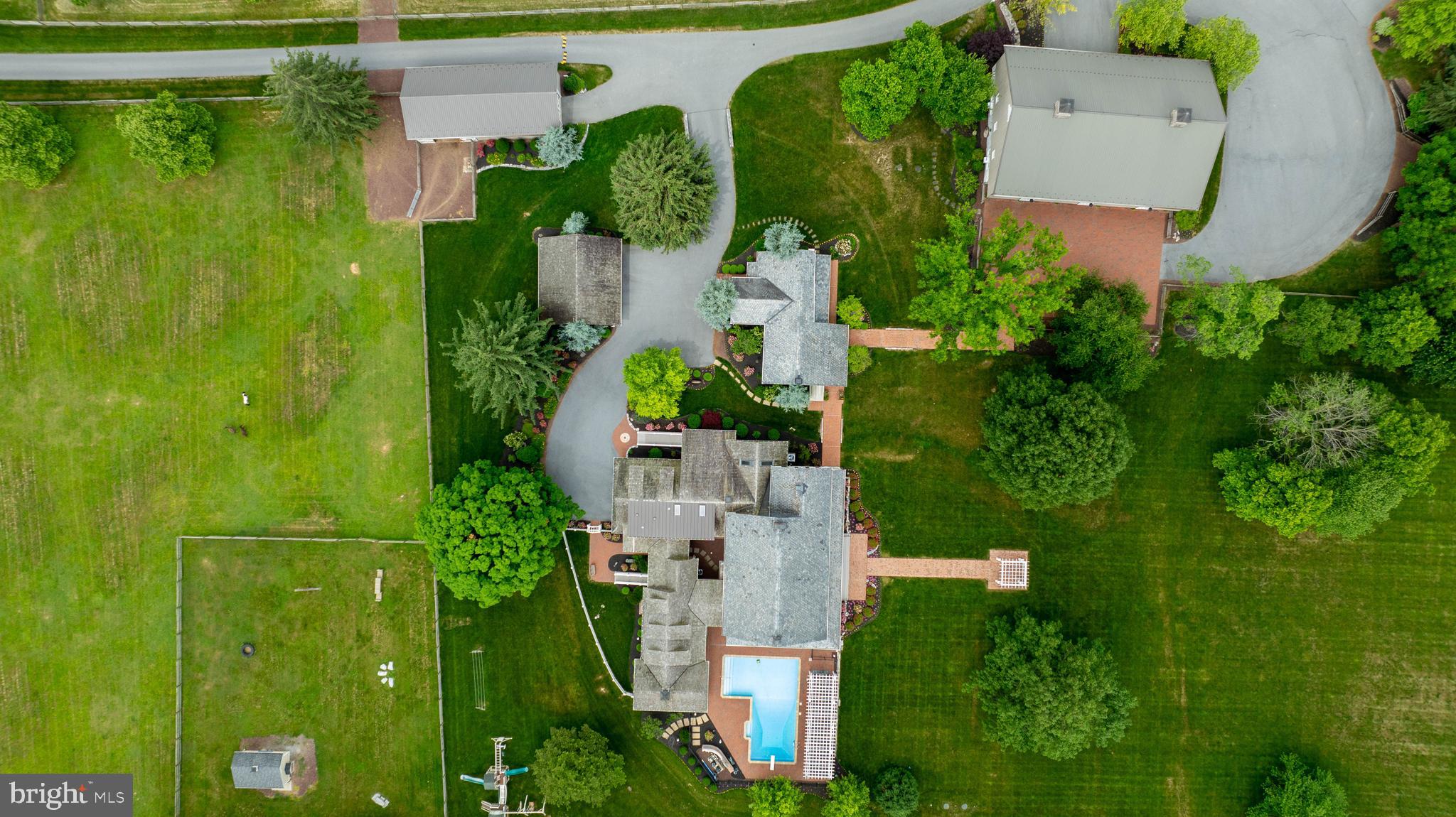 1610 Landis Road Mount Joy, PA 17552 - Photo 7 of 150 an aerial view of a house with pool yard outdoor seating and yard