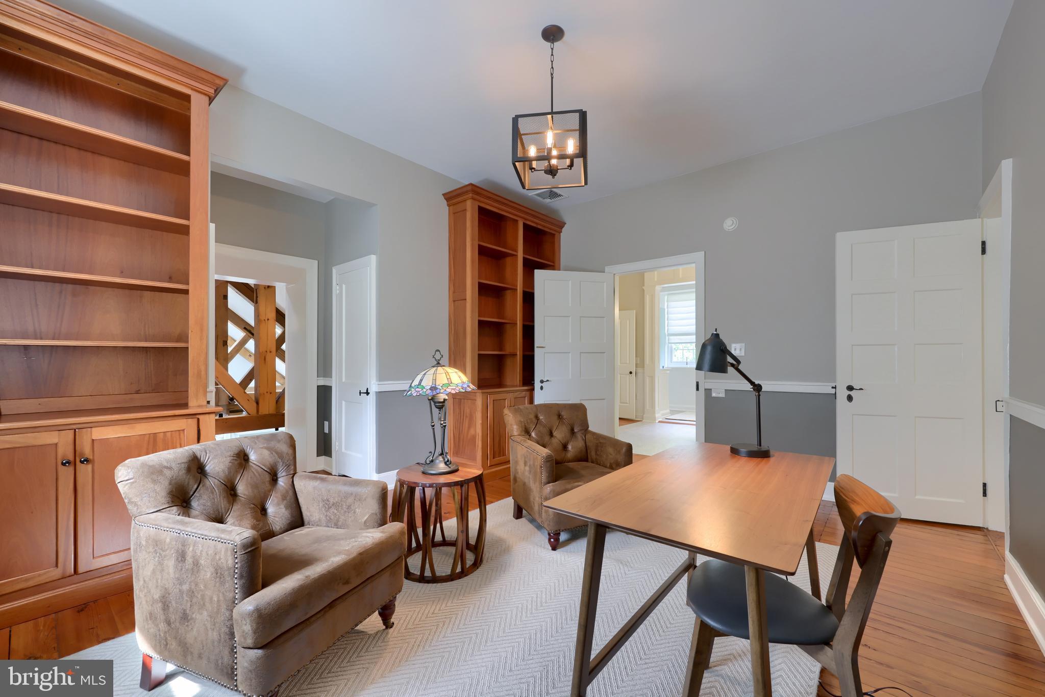 1610 Landis Road Mount Joy, PA 17552 - Photo 81 of 150 a living room with furniture a chandelier and a dining table