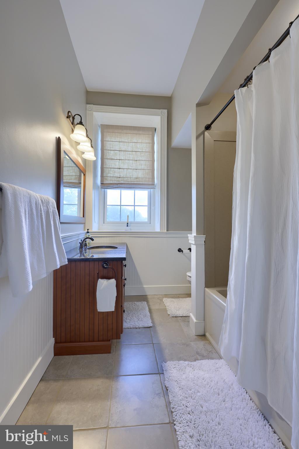 1610 Landis Road Mount Joy, PA 17552 - Photo 87 of 150 a living room with a couch and a dresser with wooden floor