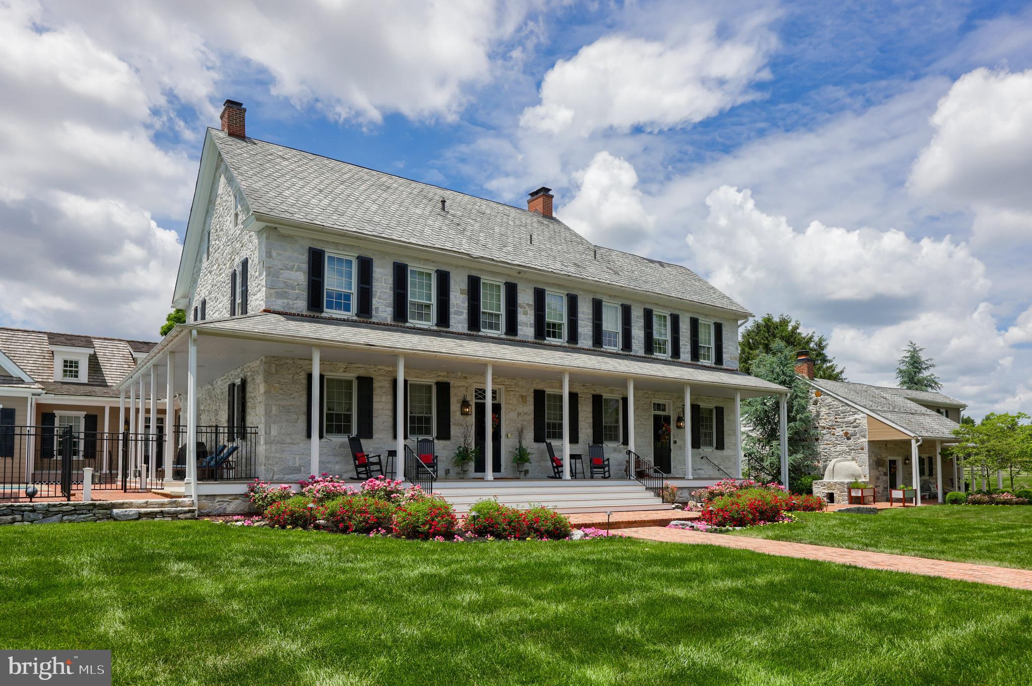 1610 Landis Road Mount Joy, PA 17552 - Photo 10 of 150 a front view of a house with a yard table and chairs