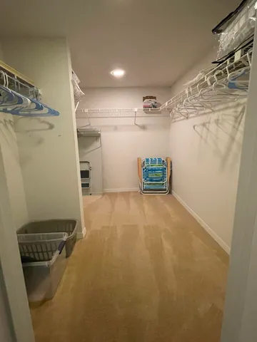 a view of storage and utility room with empty racks