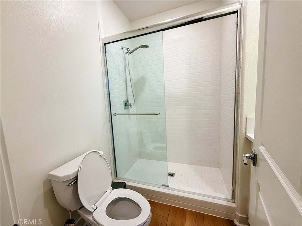 1643 Rosewell Road West Covina, CA 91791 - Photo 11 of 27 a bathroom with a shower a toilet and a shower