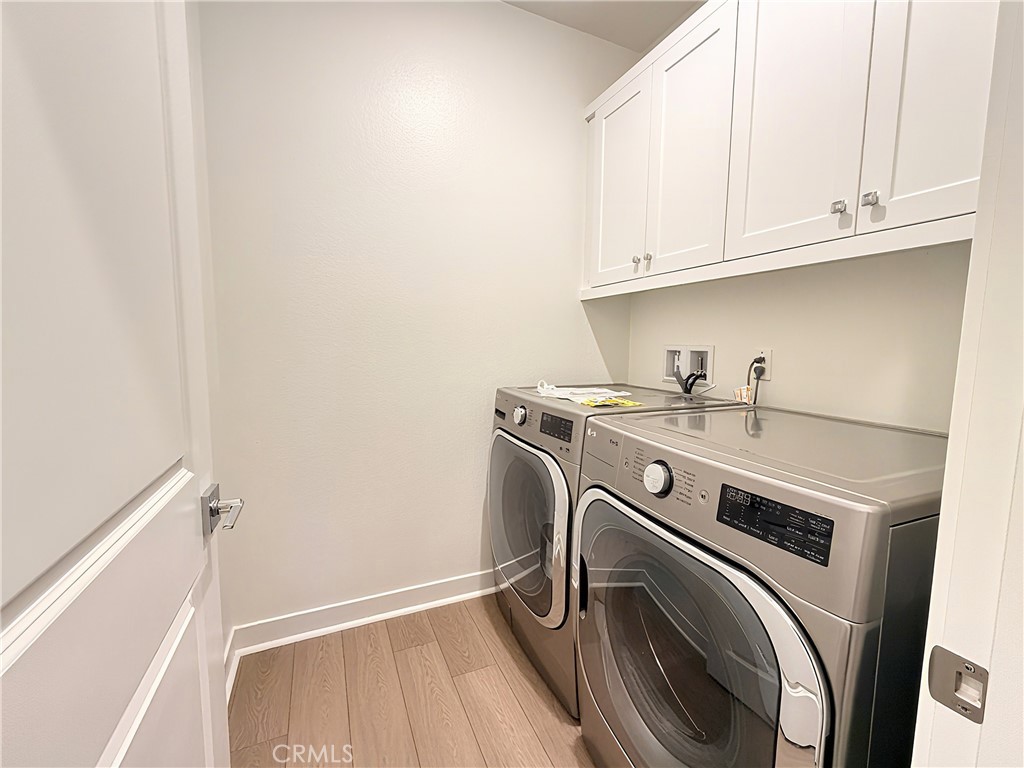 1643 Rosewell Road West Covina, CA 91791 - Photo 15 of 27 a utility room with dryer and washer