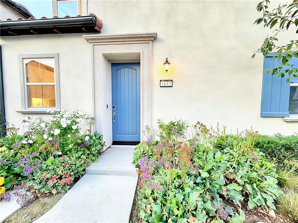 1643 Rosewell Road West Covina, CA 91791 - Photo 5 of 27 a front view of a house with a yard