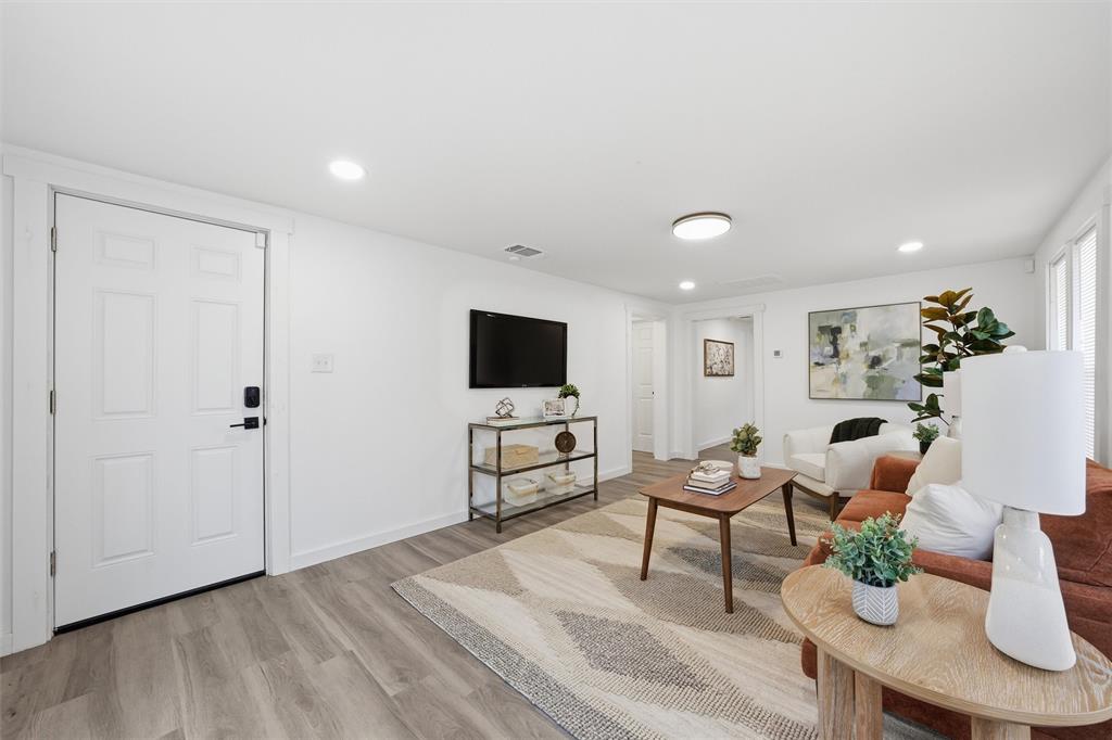 1116 Houston Street Waco, TX 76704 - Photo 4 of 16 Living area with light wood finished floors and recessed lighting