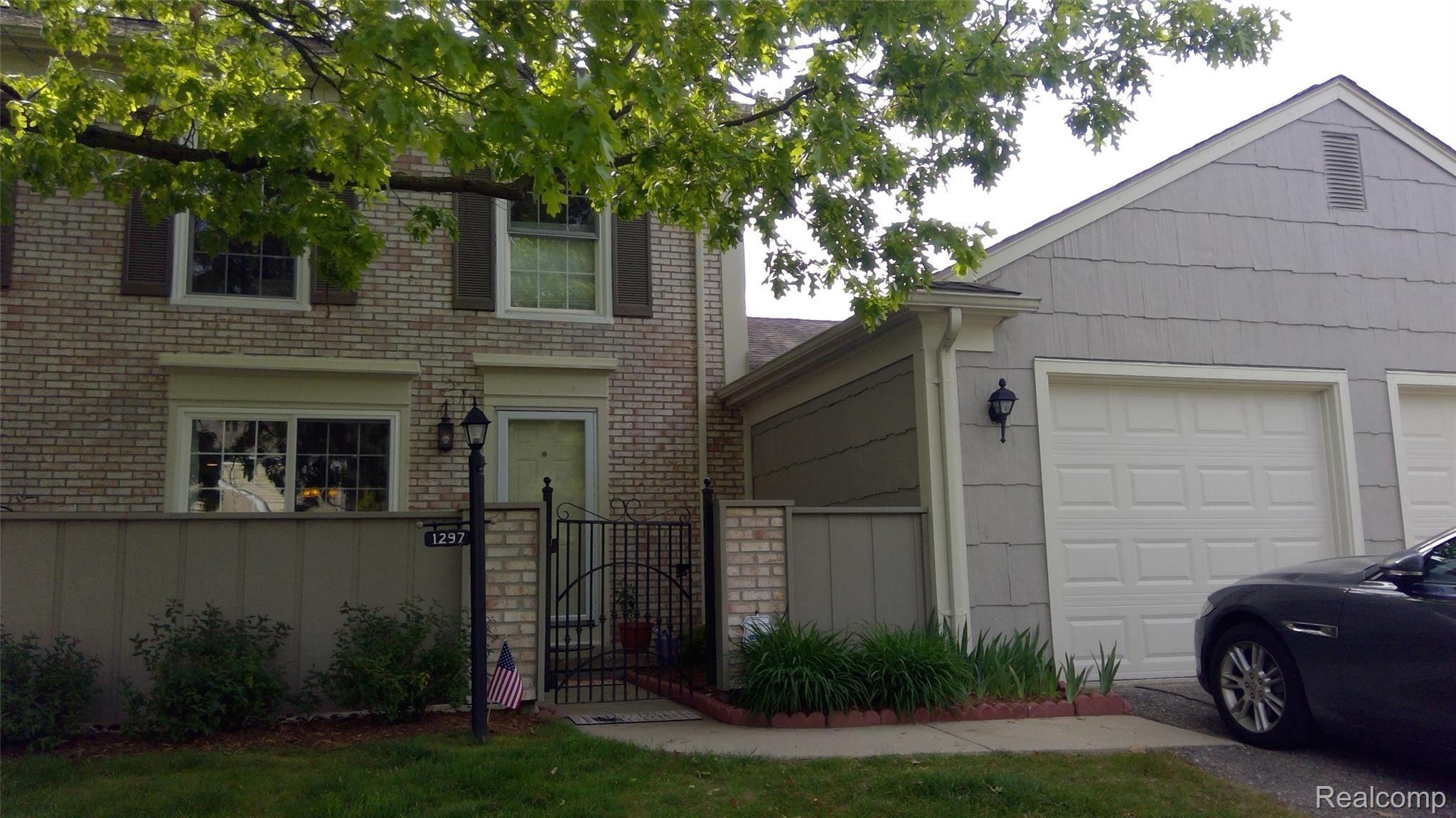 1297 Lamplighter Lane Rochester, MI 48306 - Photo 1 of 32 Gated entrace to patio, bbq area
