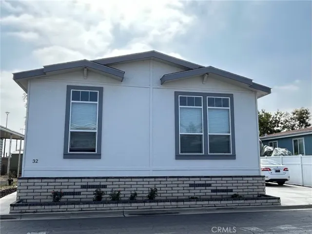 a front view of a house with garage