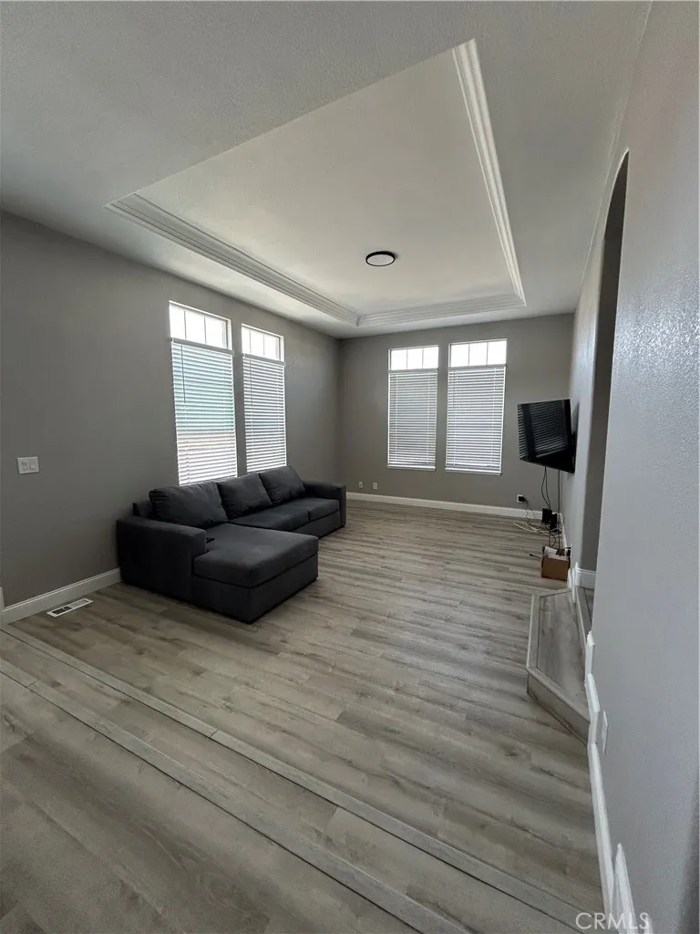 10550 Western, Unit 32 Stanton, CA 90680 - Photo 17 of 31 a living room with furniture and a large window