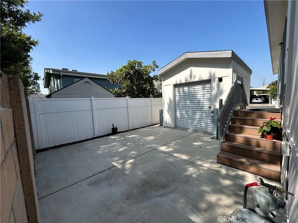 10550 Western, Unit 32 Stanton, CA 90680 - Photo 28 of 31 a view of a house with a outdoor space