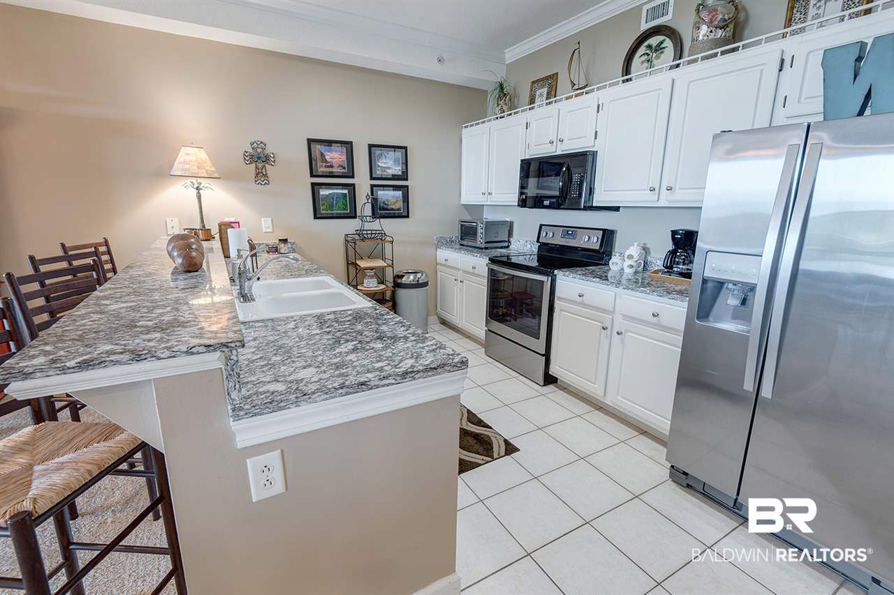27284 Gulf Road, Unit 213 Orange Beach, AL 36561 - Photo 10 of 40 Provides xtra seating.
