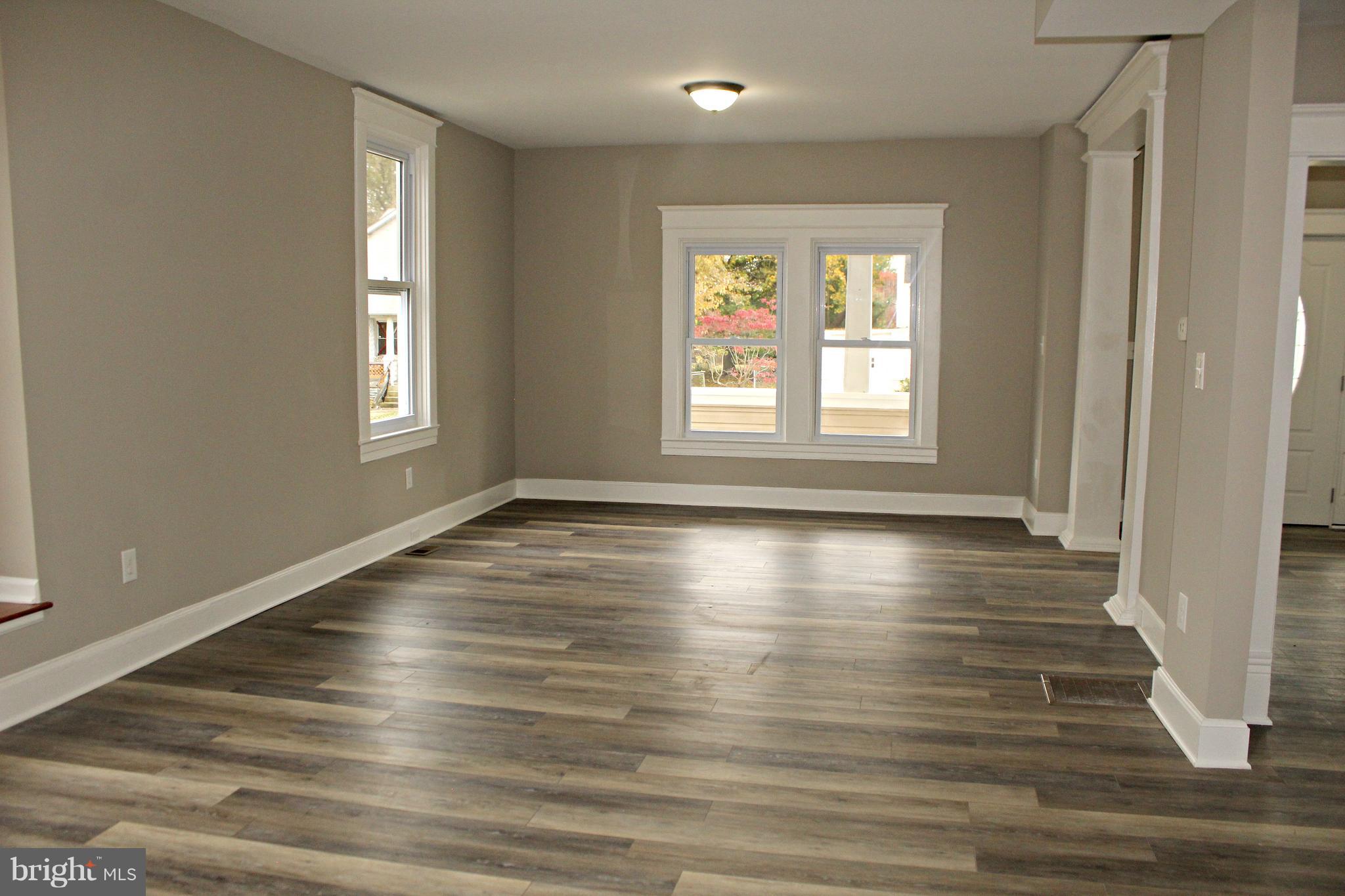 4406 Raspe Avenue Baltimore, MD 21206 - Photo 7 of 29 New Paint & Luxury Plank Flooring in Living Room!