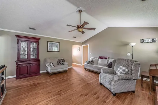 a kitchen with a sink stove and refrigerator