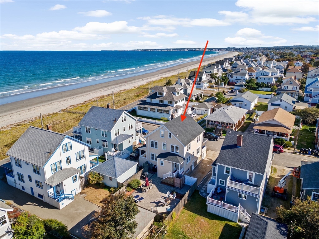79 F Street Hull, MA 02045 - Photo 2 of 42 an aerial view of a building with outdoor space and ocean view