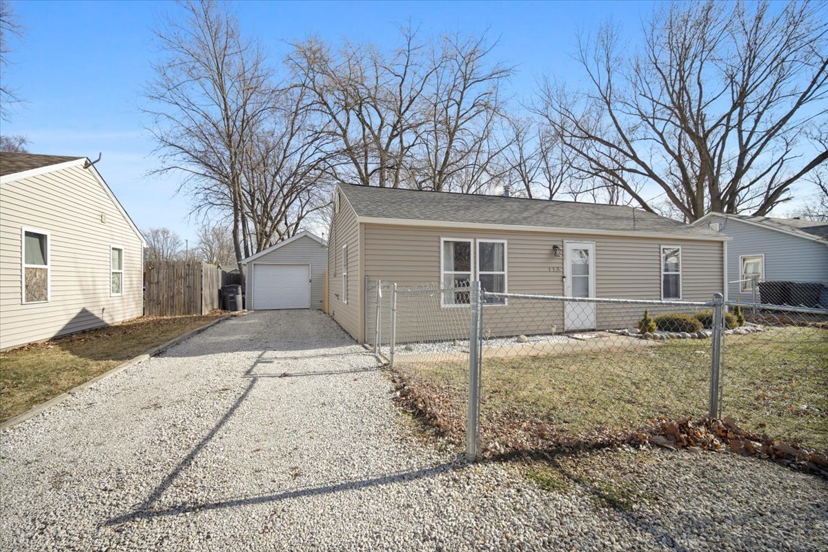 118 Florida Avenue Washington, IL 61571 - Photo 2 of 23 front view of a house with a yard