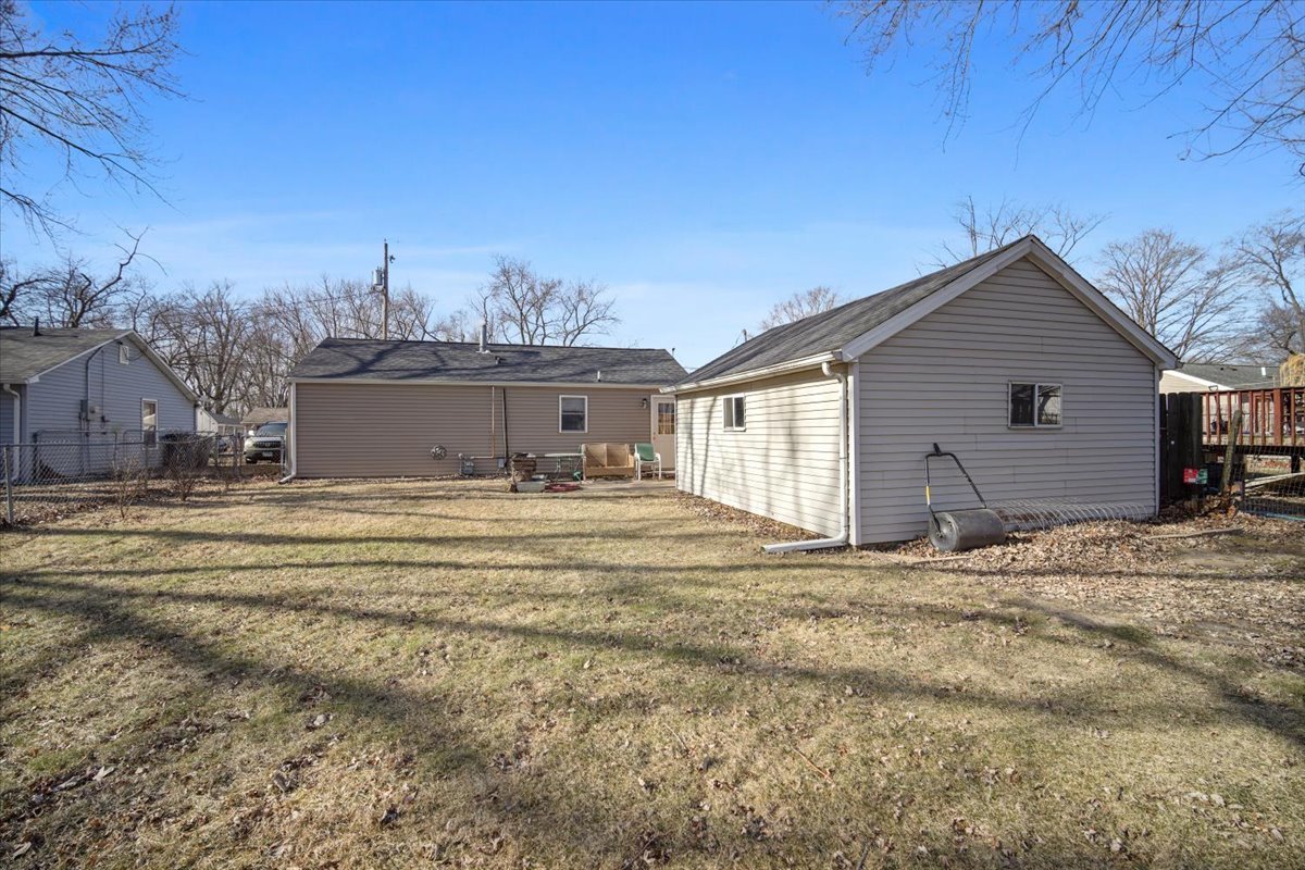 118 Florida Avenue Washington, IL 61571 - Photo 22 of 23 a view of a house with a backyard
