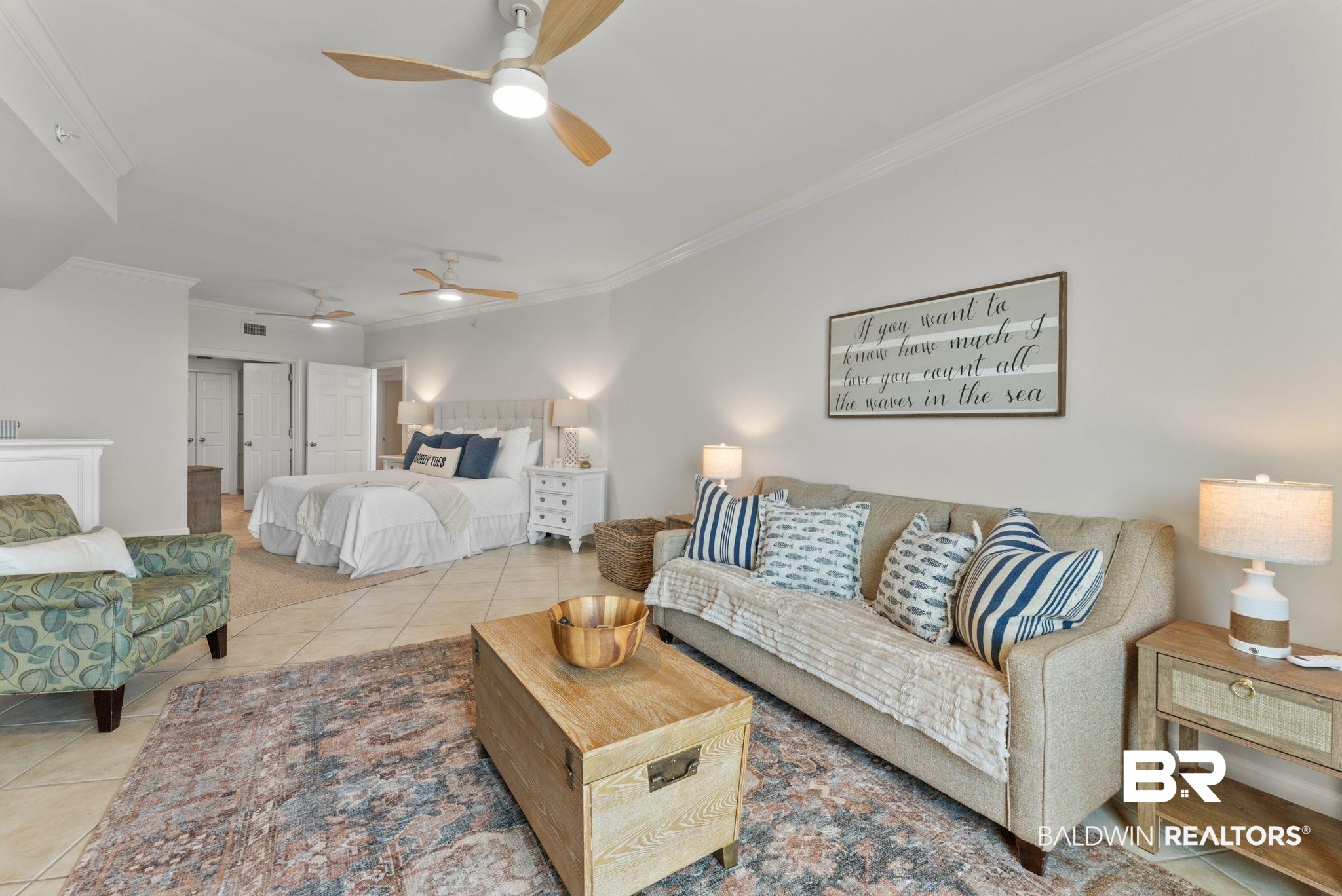 27580 Canal Road, Unit 1233 Orange Beach, AL 36561 - Photo 23 of 79 Bedroom with ornamental molding, light tile patterned flooring, a closet, and ceiling fan