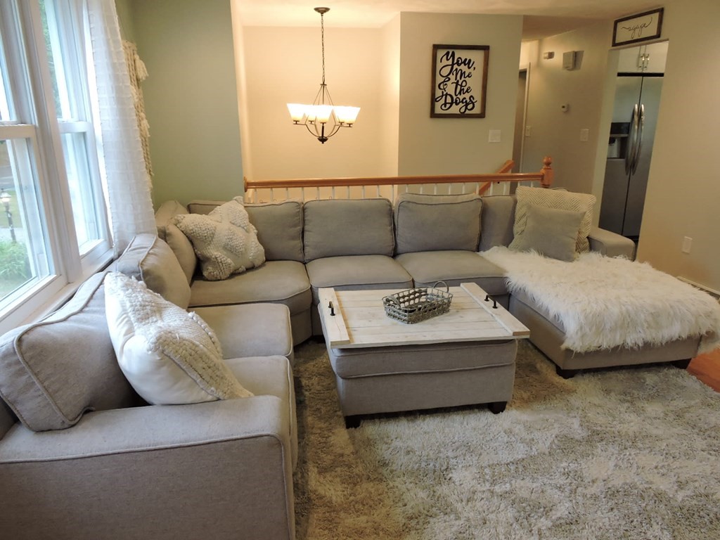 46 Lexington Road Billerica, MA 01821 - Photo 4 of 41 a living room with furniture and a couch