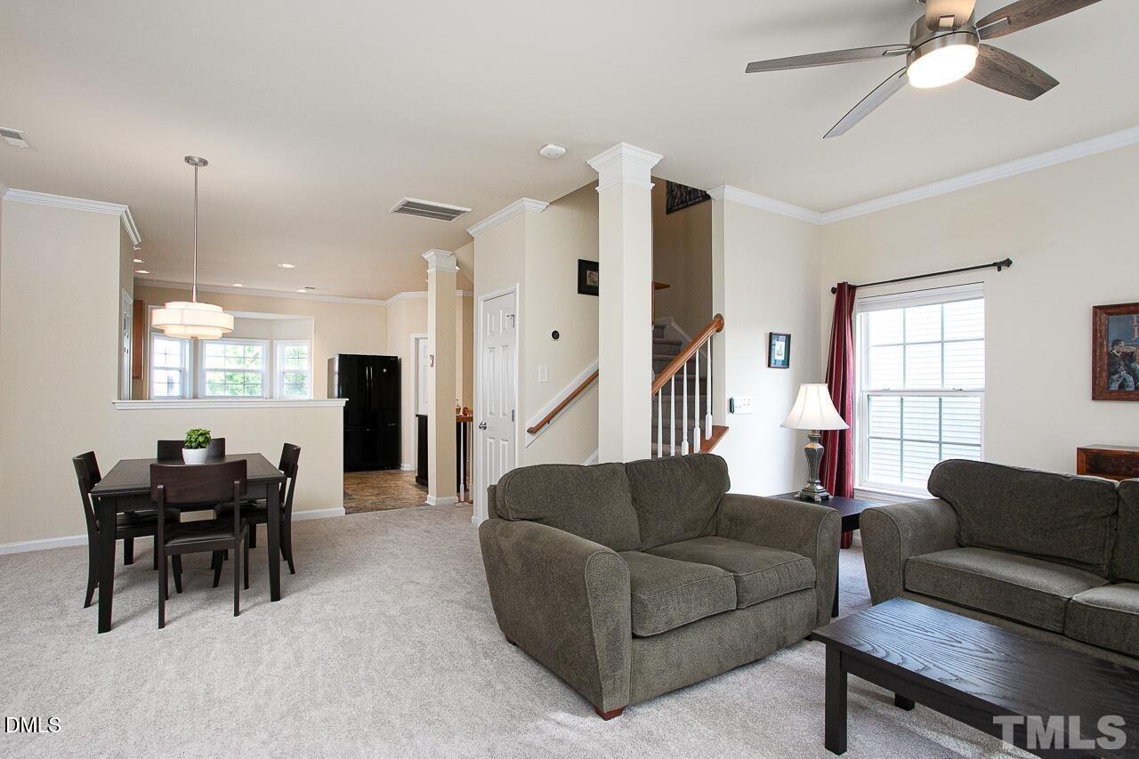 1662 Snow Mass Way Durham, NC 27713 - Photo 12 of 24 a living room with furniture and a large window