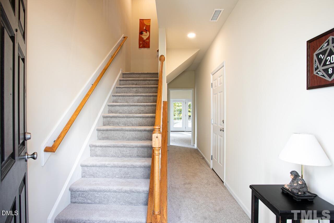 1662 Snow Mass Way Durham, NC 27713 - Photo 2 of 24 a view of a hallway with seating area