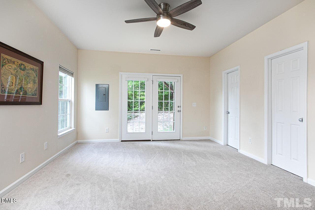 1662 Snow Mass Way Durham, NC 27713 - Photo 21 of 24 a view of livingroom with window ceiling fan and windows
