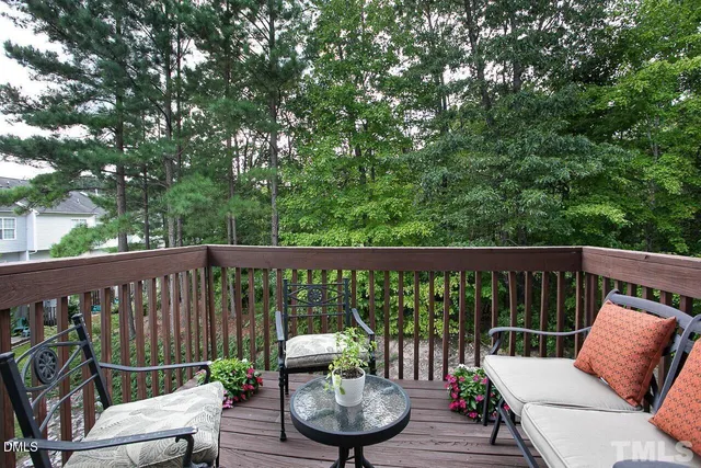 a view of a two chairs in the deck