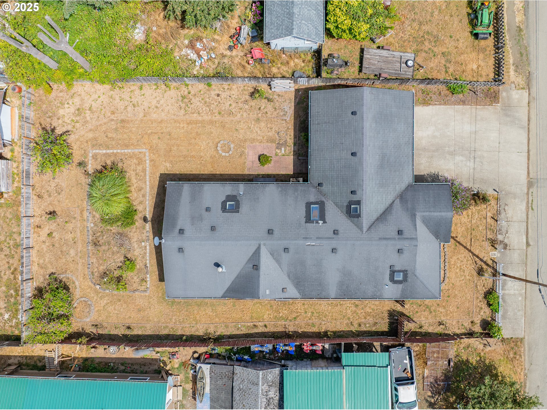1829 East Willow Street Myrtle Point, OR 97458 - Photo 37 of 37 an aerial view of a house with a garden