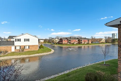 a view of a lake with houses