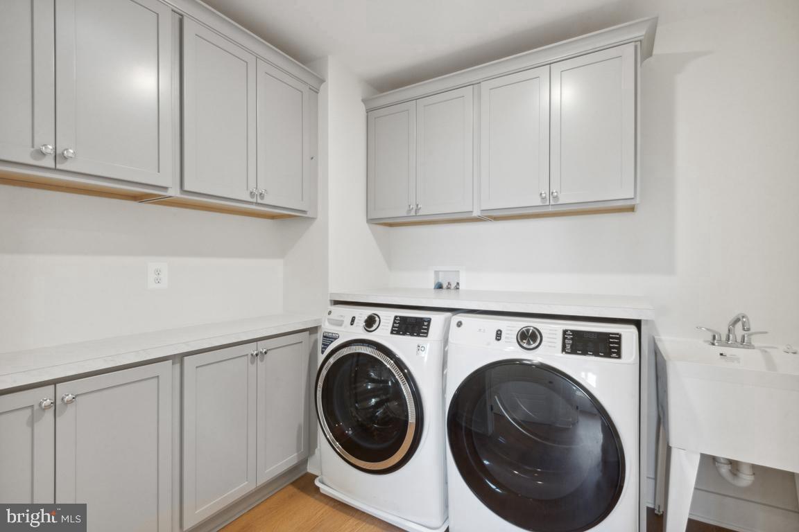 3110 Thurston Road Frederick, MD 21704 - Photo 29 of 38 Large laundry room with storage.