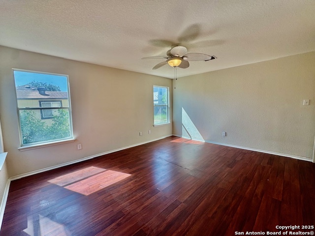 3607 Andera Fields Converse, TX 78109 - Photo 11 of 24 an empty room with wooden floor and windows