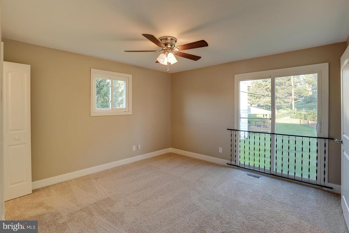 1533 Weyburn Road Baltimore, MD 21237 - Photo 18 of 30 a view of an empty room with a window