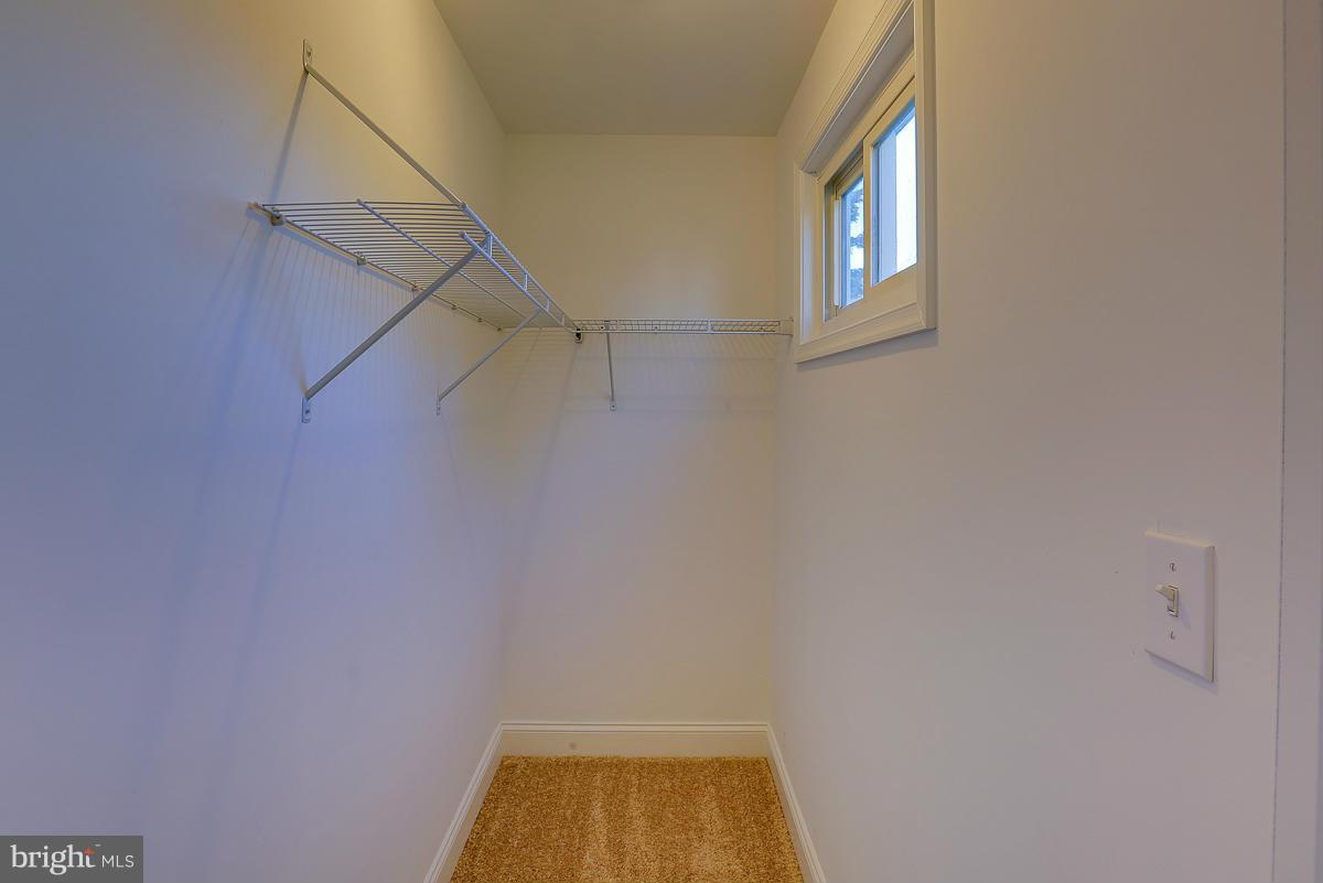 1533 Weyburn Road Baltimore, MD 21237 - Photo 19 of 30 a view of small space with racks on the wall