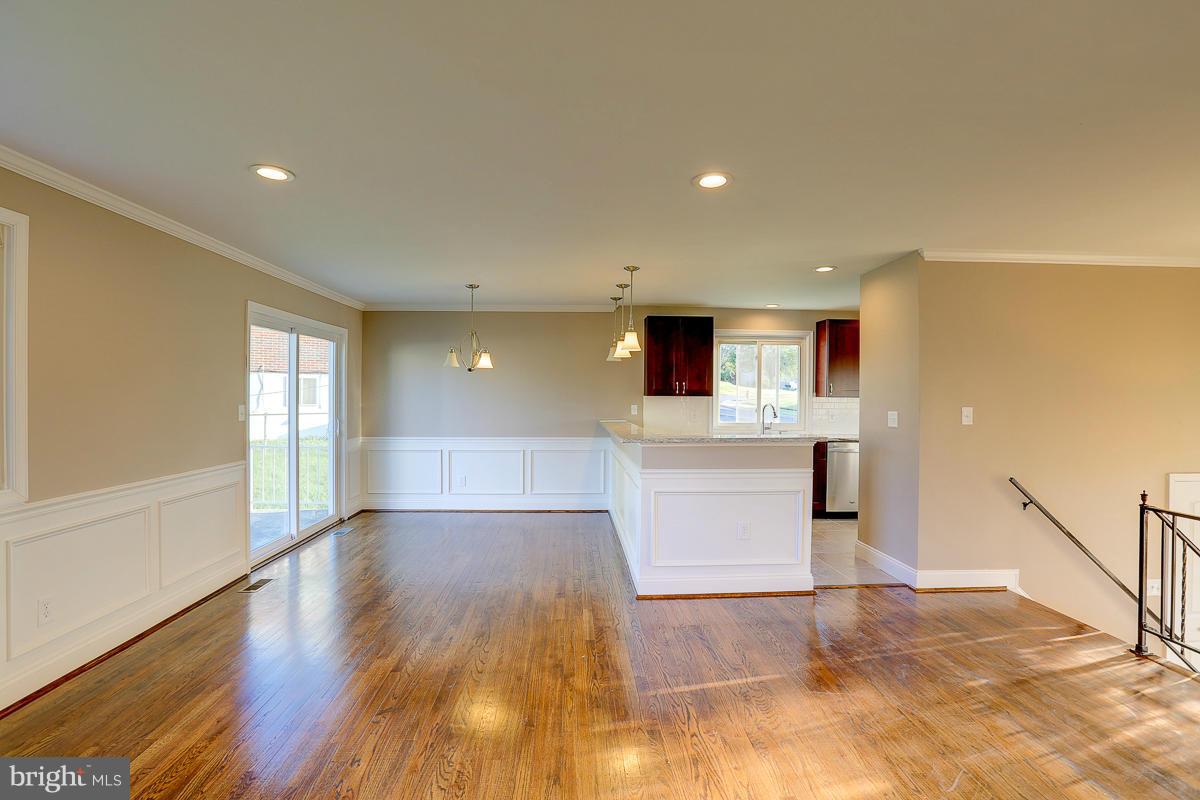 1533 Weyburn Road Baltimore, MD 21237 - Photo 4 of 30 a view of a kitchen with a sink and a refrigerator