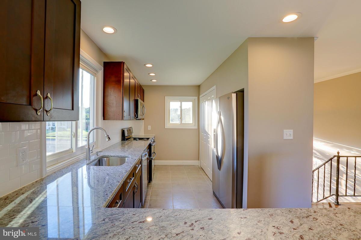 1533 Weyburn Road Baltimore, MD 21237 - Photo 8 of 30 a view of a kitchen cabinets a sink and dishwasher