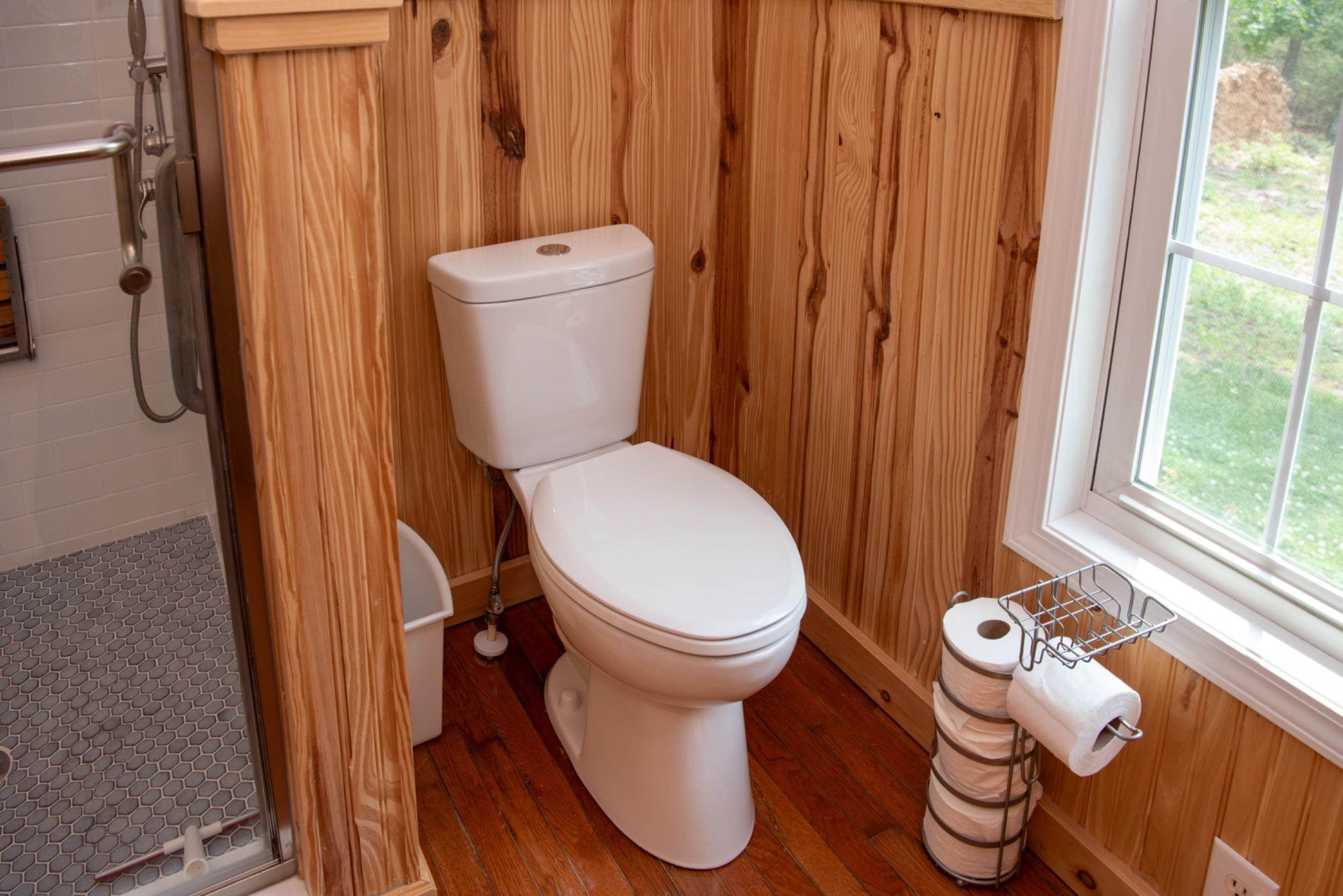 792 Forest Glen Road Moorefield, WV 26836 - Photo 68 of 146 Charming ensuite bathroom w/natural wood accents.