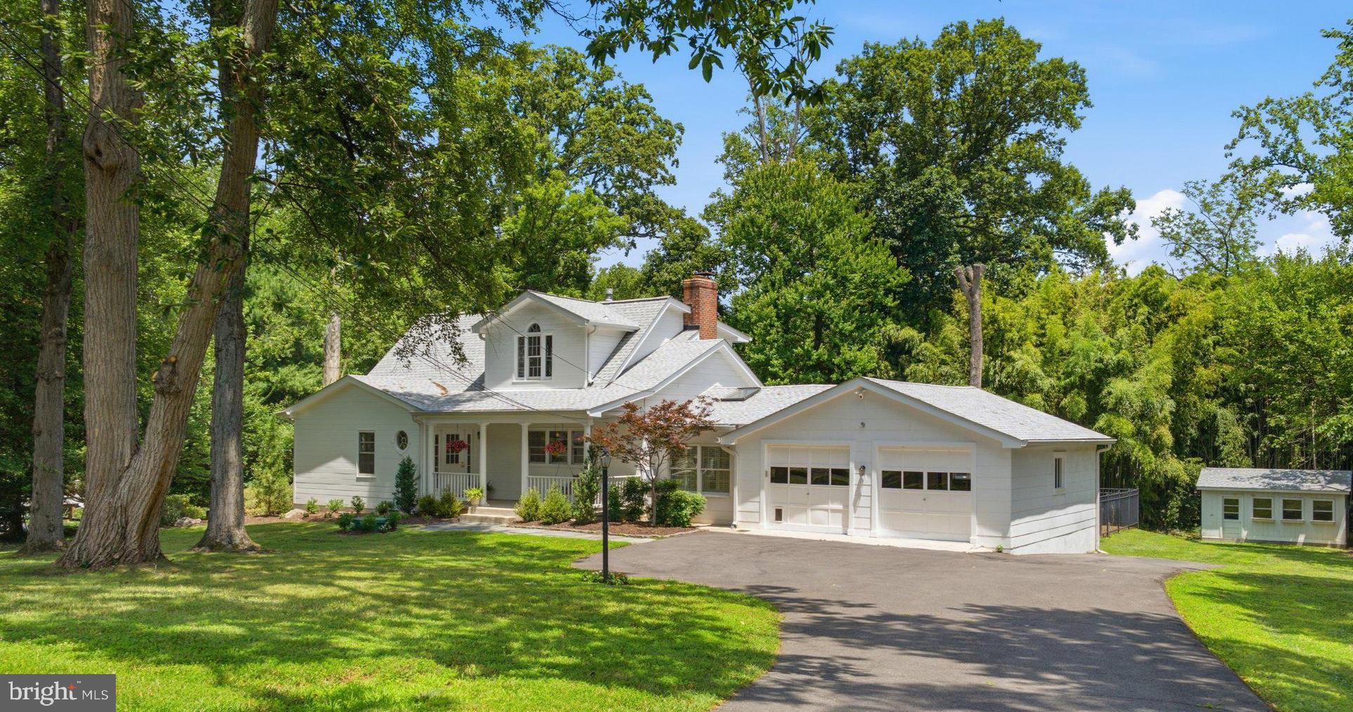 2627 Five Oaks Road Vienna, VA 22181 - Photo 1 of 1 Charming home nestled in lush greenery.