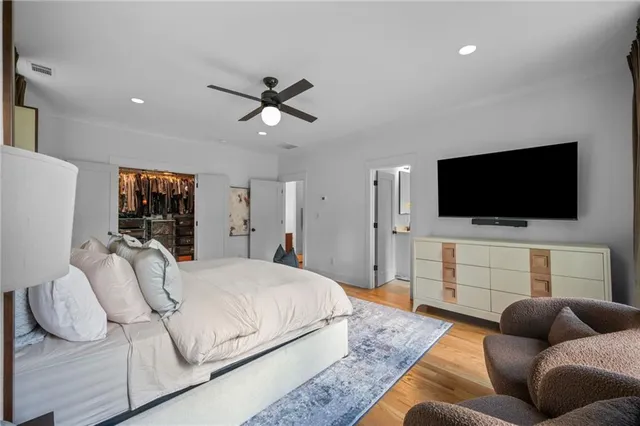 a living room with furniture fireplace and flat screen tv