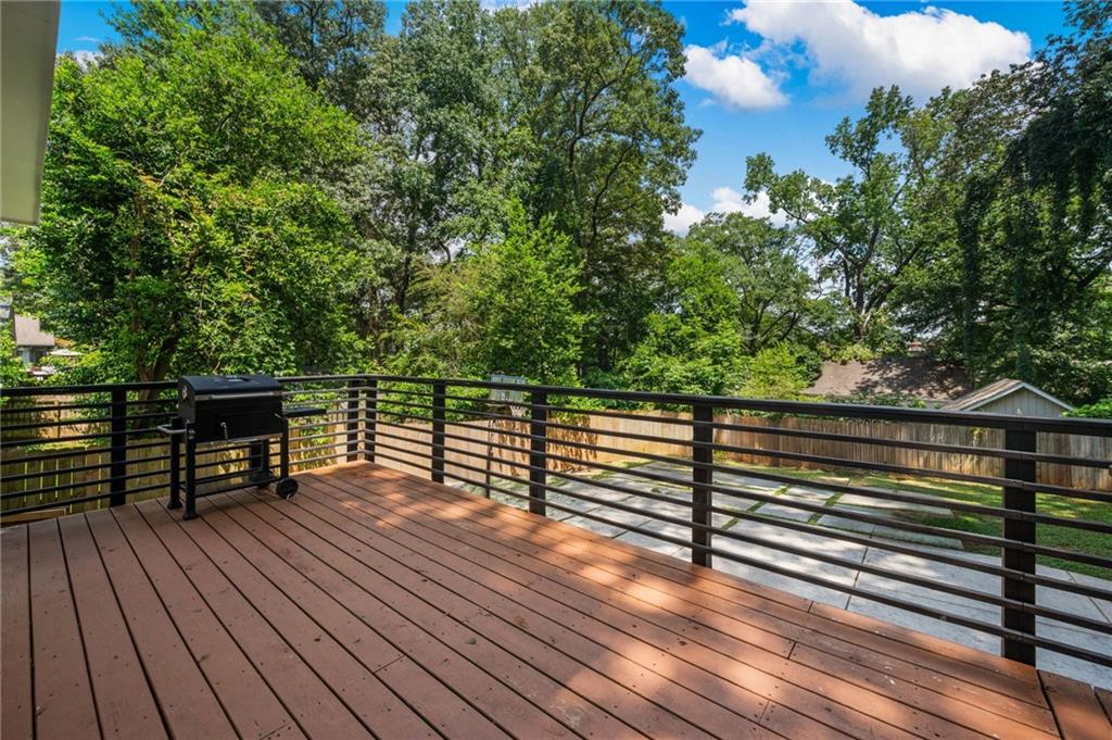 1058 Sanders Avenue Southeast Atlanta, GA 30316 - Photo 32 of 55 a view of outdoor space with deck and wooden floor