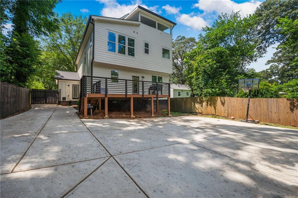 1058 Sanders Avenue Southeast Atlanta, GA 30316 - Photo 38 of 55 a view of a house with a yard and potted plants