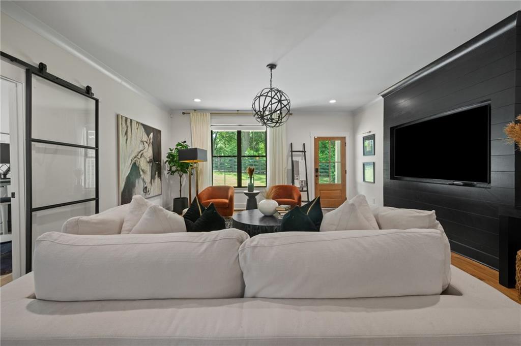 1058 Sanders Avenue Southeast Atlanta, GA 30316 - Photo 44 of 55 a living room with fireplace furniture and a flat screen tv