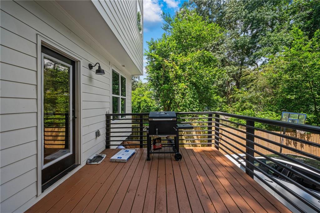 1058 Sanders Avenue Southeast Atlanta, GA 30316 - Photo 51 of 55 a view of balcony with deck and wooden floor