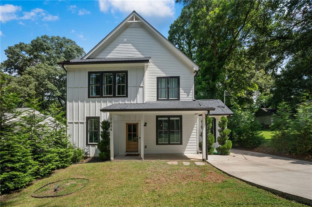 1058 Sanders Avenue Southeast Atlanta, GA 30316 - Photo 52 of 55 a front view of a house with a garden