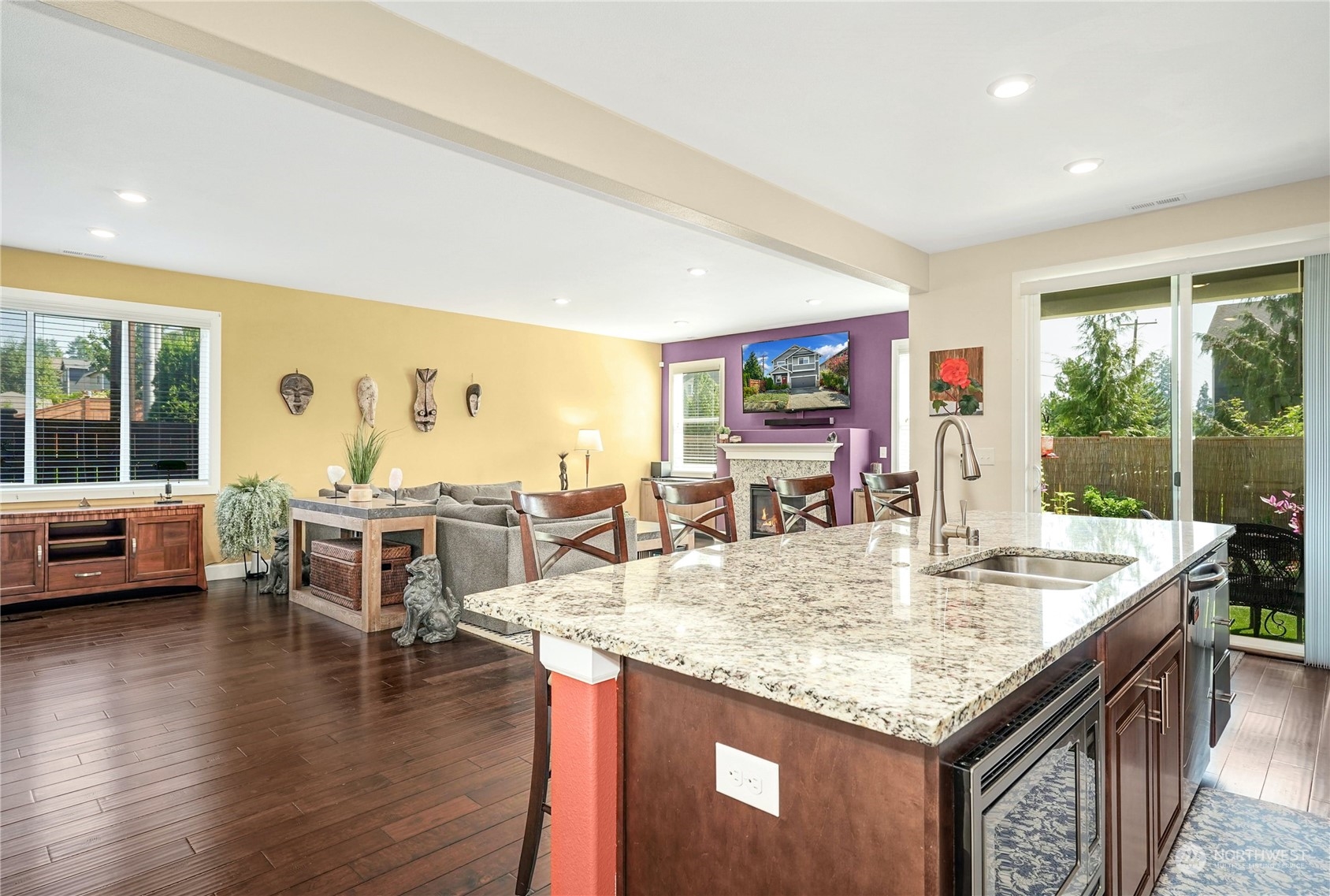 4012 174th Street Southeast Bothell, WA 98012 - Photo 15 of 36 a kitchen with center island table and chairs