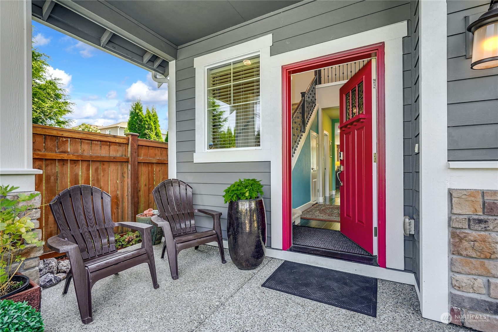 4012 174th Street Southeast Bothell, WA 98012 - Photo 2 of 36 a view of a two chairs in the porch