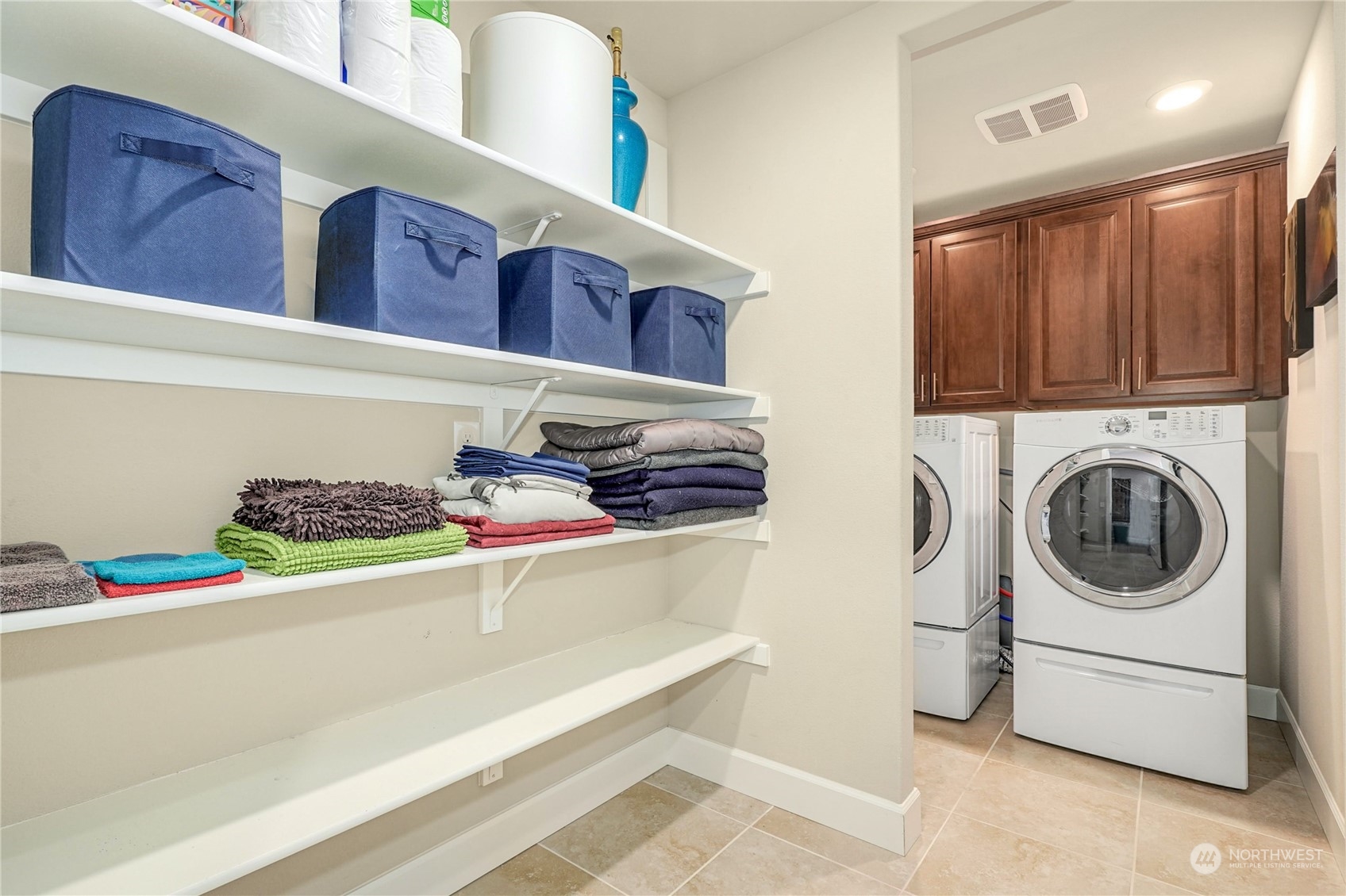 4012 174th Street Southeast Bothell, WA 98012 - Photo 24 of 36 a kitchen that has a washer and dryer