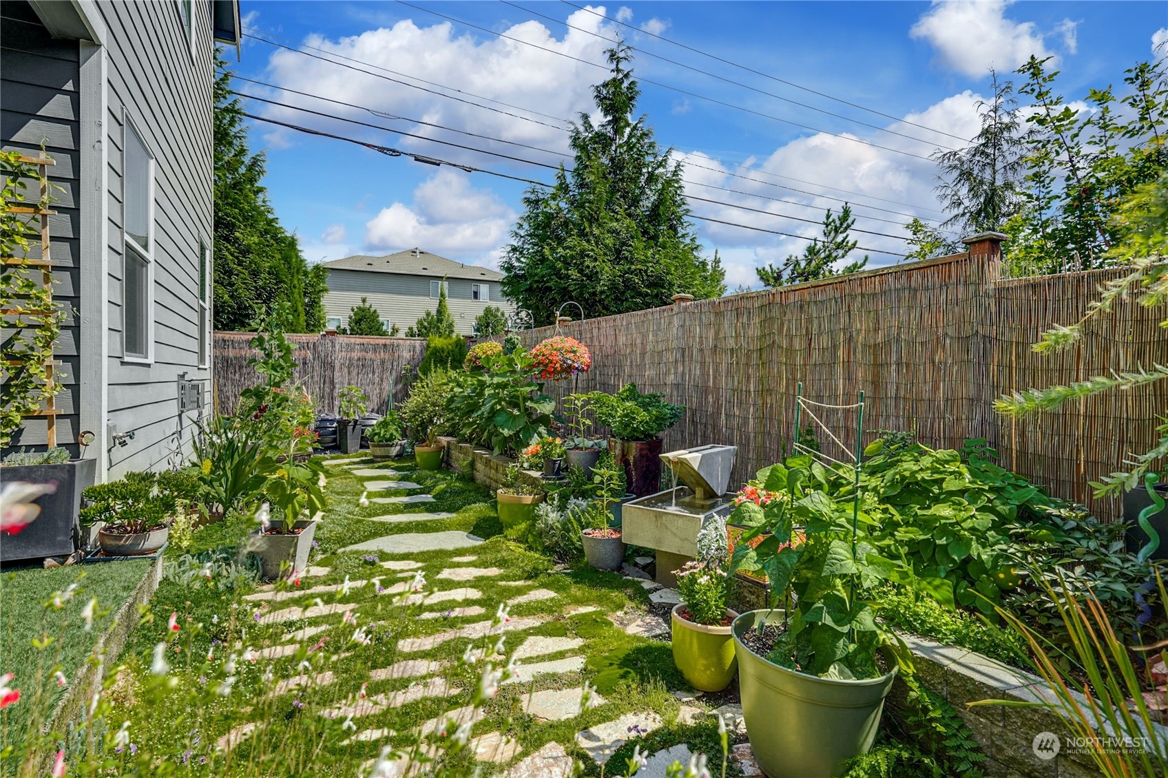 4012 174th Street Southeast Bothell, WA 98012 - Photo 30 of 36 a backyard of a house with lots of green space