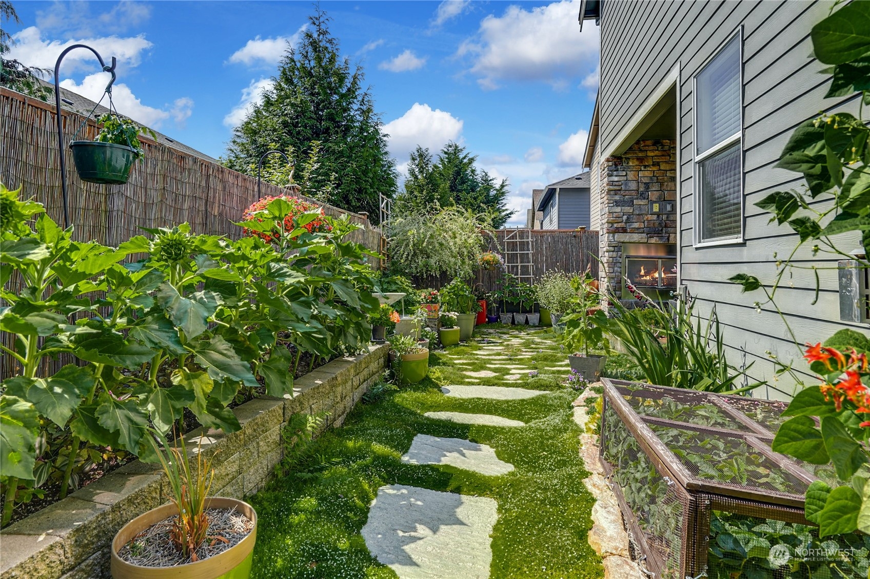 4012 174th Street Southeast Bothell, WA 98012 - Photo 31 of 36 a backyard of a house with lots of green space