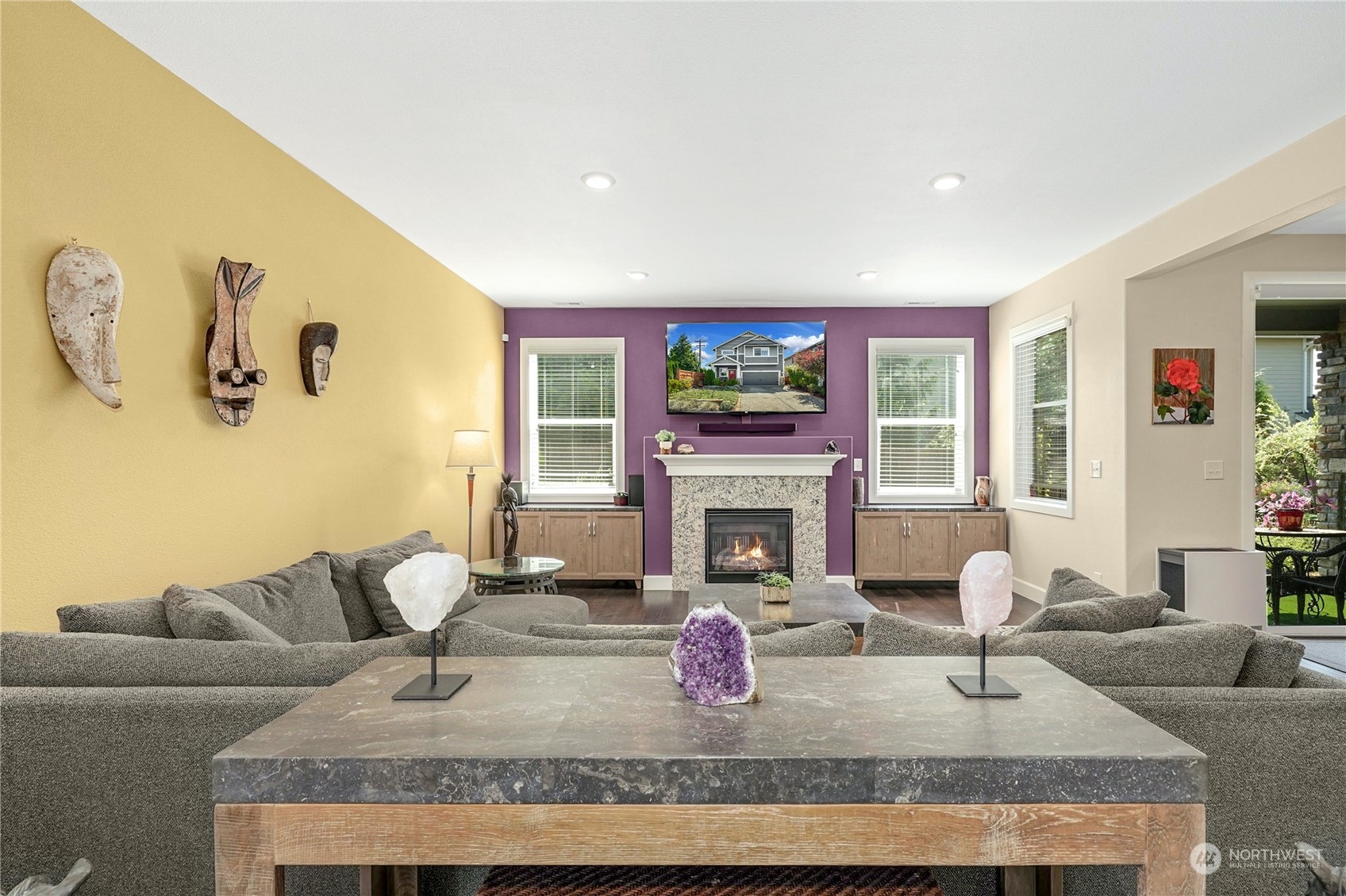 4012 174th Street Southeast Bothell, WA 98012 - Photo 7 of 36 a living room with furniture and a fireplace