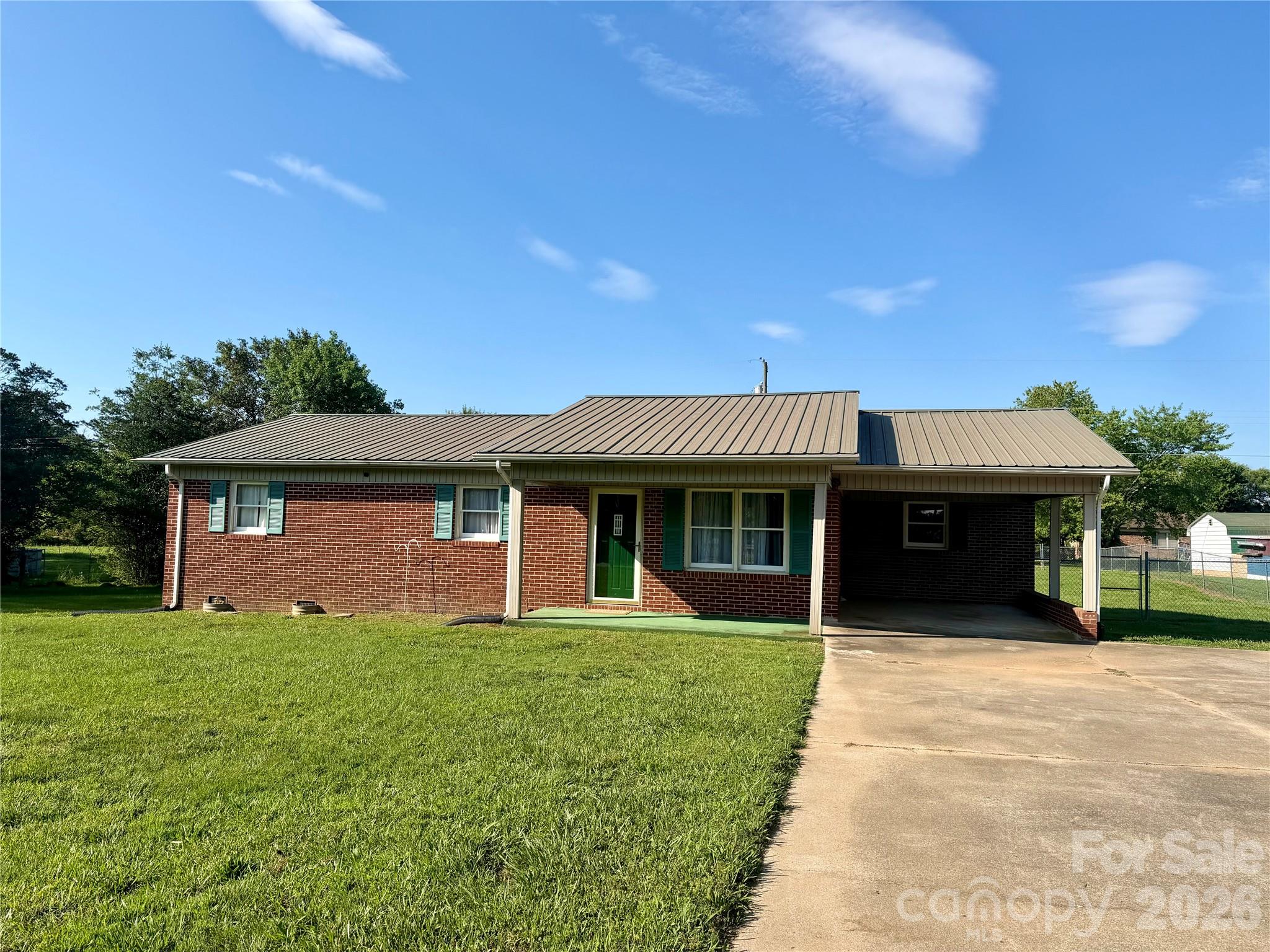 372 Ferry Road Forest City, NC 28043 - Photo 2 of 36 a front view of a house with yard