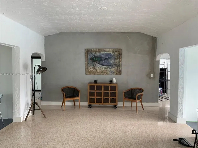 a living room with a large window